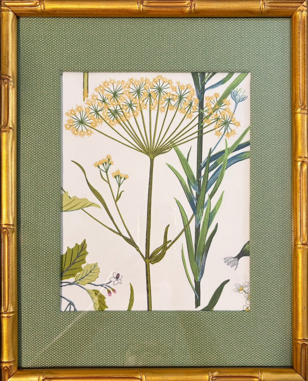 Isabella yellow botanical fabric artwork with tall green stems, custom-made Callen Green mat and gold bamboo-style frame.