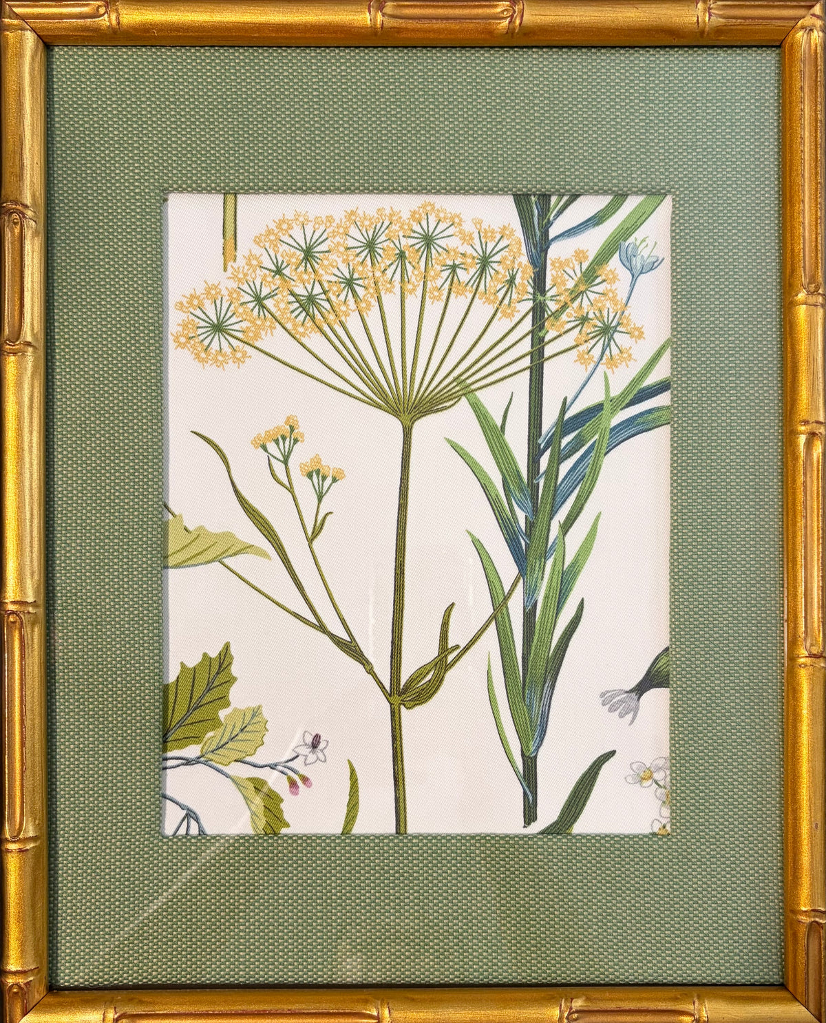 Isabella yellow botanical fabric artwork with tall green stems, custom-made Callen Green mat and gold bamboo-style frame.