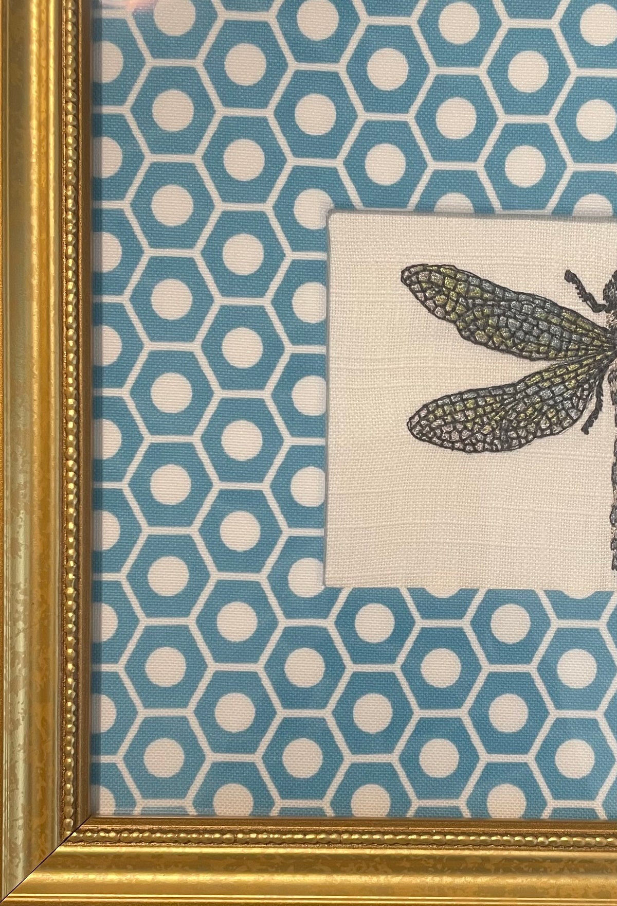 Embroidered Dragonfly surrounded by Schumacher Queen B Custom Fabric Mat