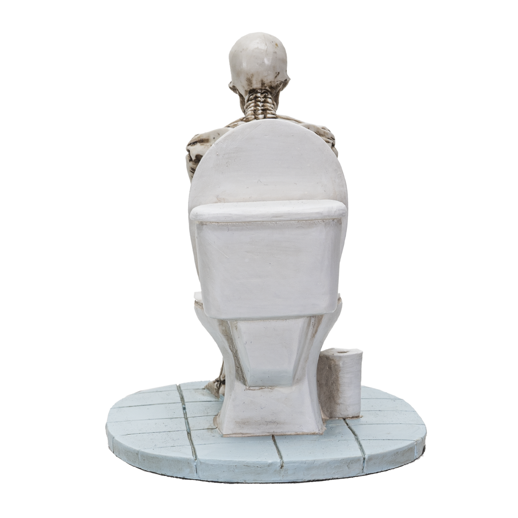 Skeleton on Toilet