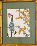 Isabella fabric artwork with a purple butterfly, blue and yellow flowers, custom-made Callen Green mat and gold bamboo-style frame.