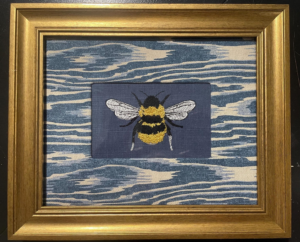 Adorable Bee surrounded by Ballard Designs Darcy Blue Fabric Mat