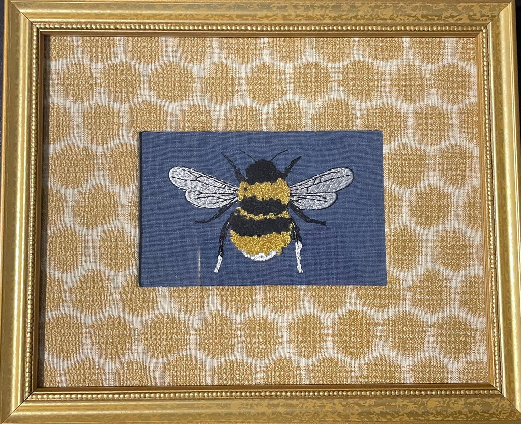 Mia Dijon Ballard Designs honeycomb fabric mat with adorable embroidered/boucle blue bee