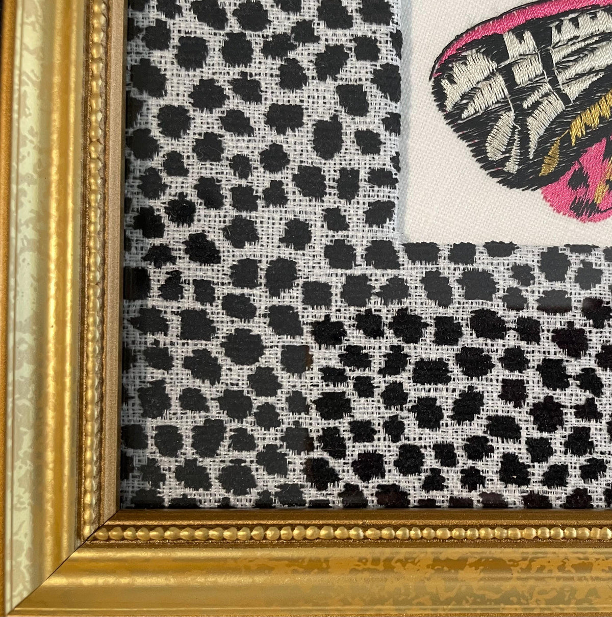 Embroidered Butterfly Moth surrounded by Ballard Designs Tully Ebony Fabric Mat